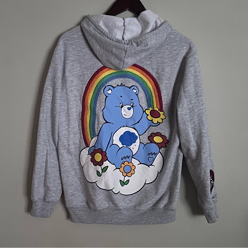 Care Bears | Grumpy Bear Rainbow Graphic Hoodie | S (4/6)